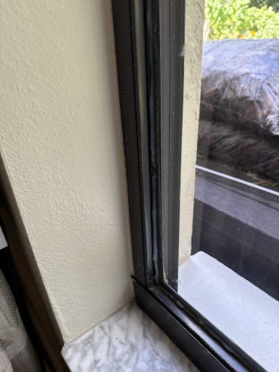 Securing and Sealing the Replacement Glass